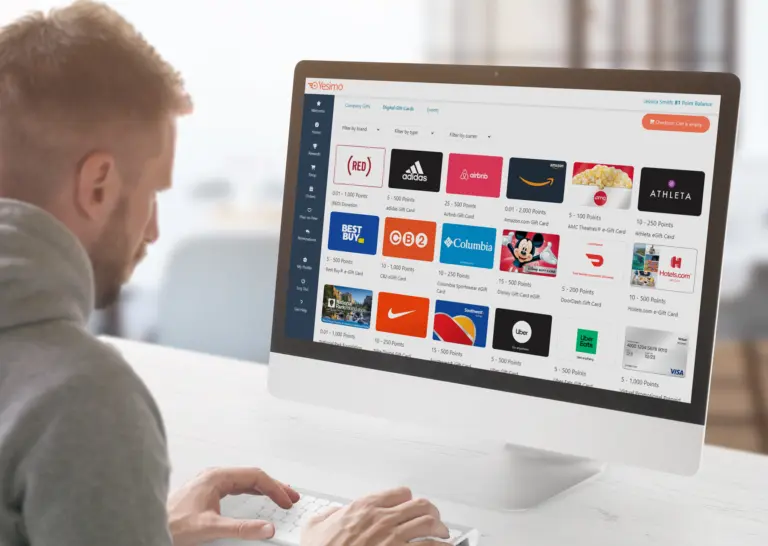 Man using the Yesimo corporate gifting platform to browse digital gift cards on desktop